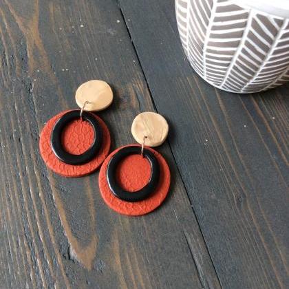 Fayola Circle In Red, Beige, And Black Polymer..
